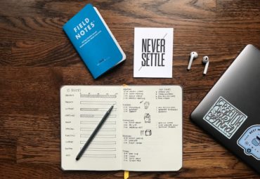 desk and books showing productivity notes