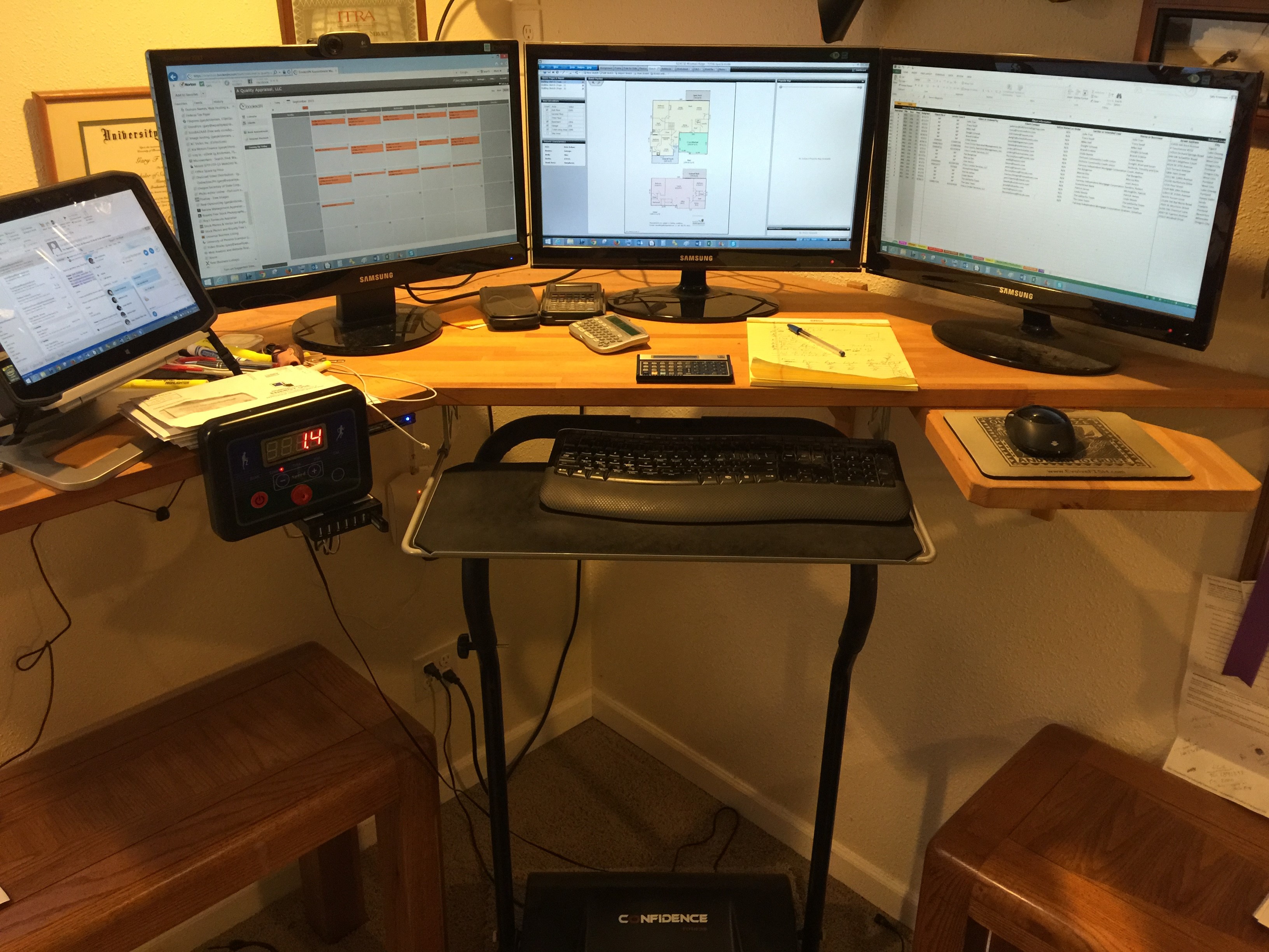 Gary's standing/treadmill desk with a full monitor dedicated to BookedIN!