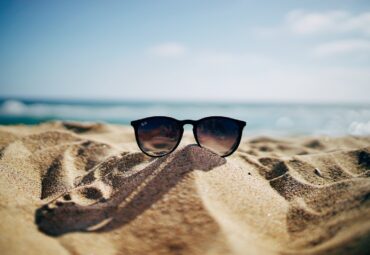 sunglasses on a beach