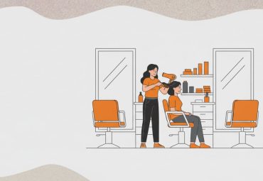 Hairstylist blow-drying a client's hair in a bright, modern hair salon