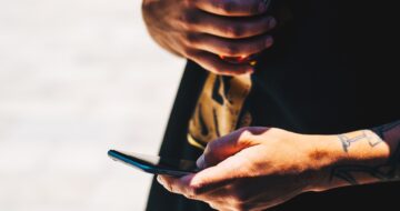 man holding mobile phone